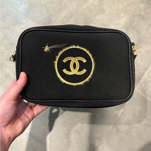 Chanel Black and Gold Cosmetic Bag with Iconic Logo